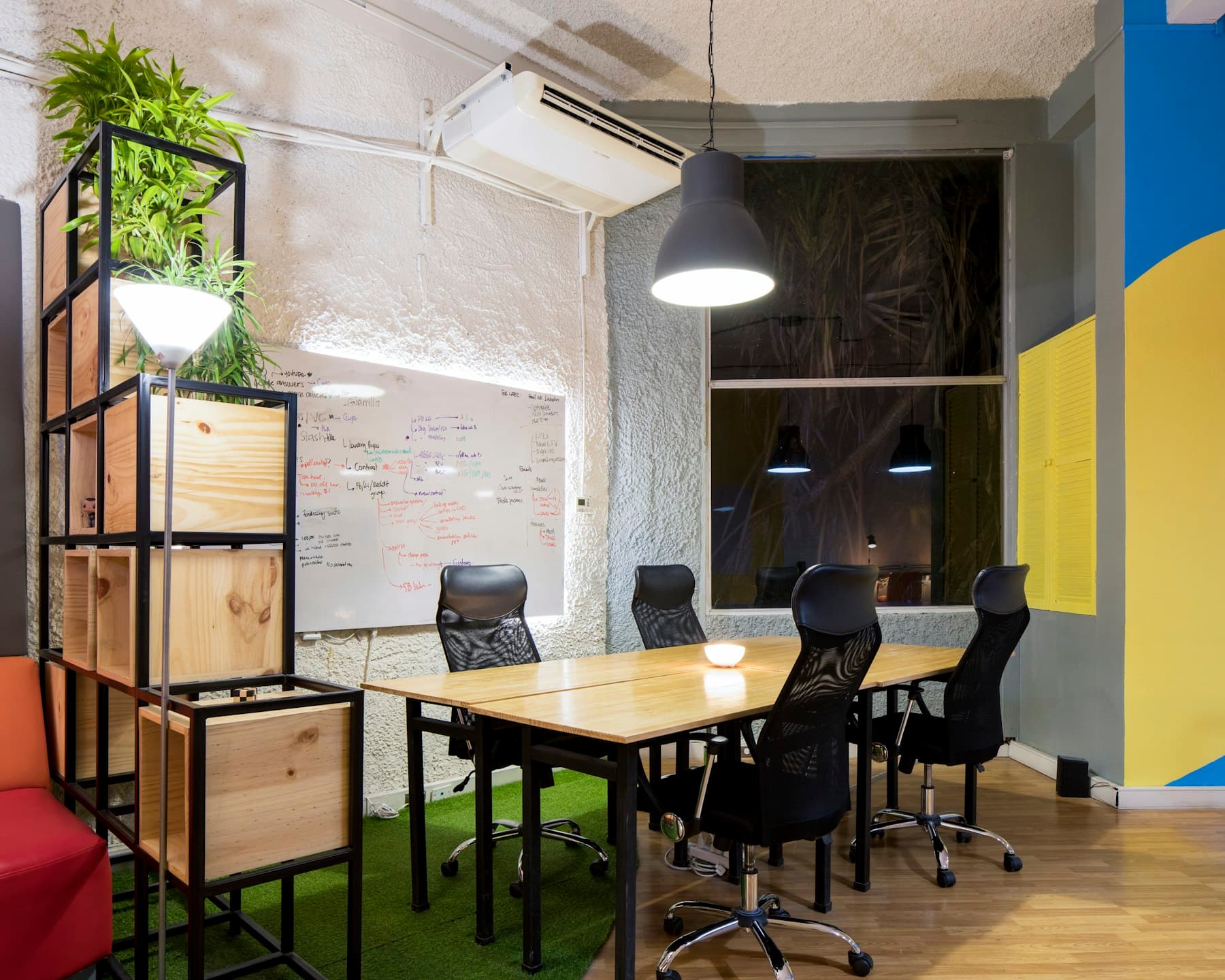 Empty meeting room with whiteboard and chairs treated in hard black and white